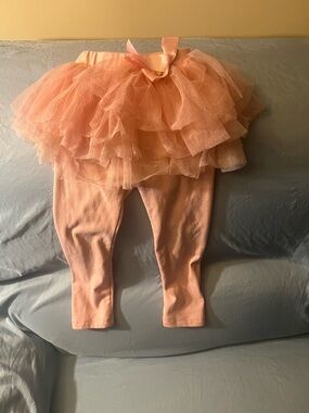 Light pink leggings with attached tutu